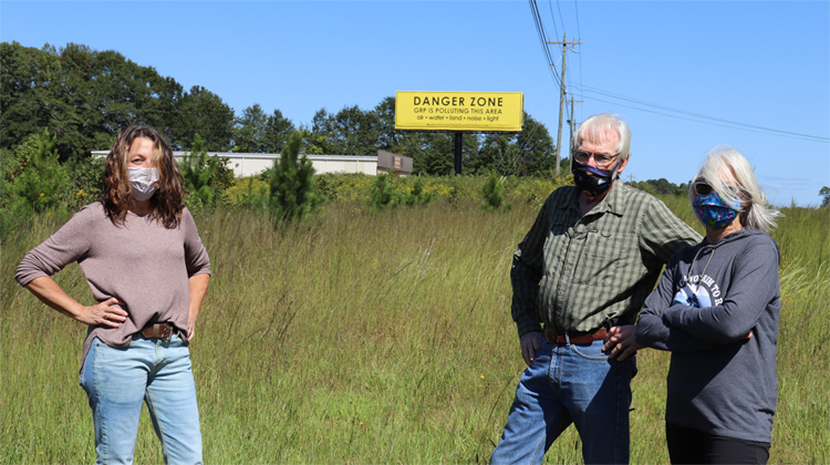 MCCPC members and billboard