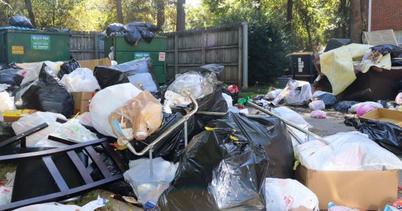 open air trash pile at Oakridge Condominiums