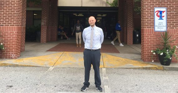 Principal Pendley outside Clarke Middle School