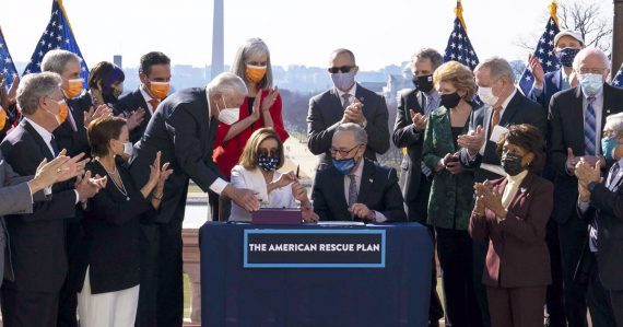 Pelosi and Schumer sign the American Rescue Plan into law