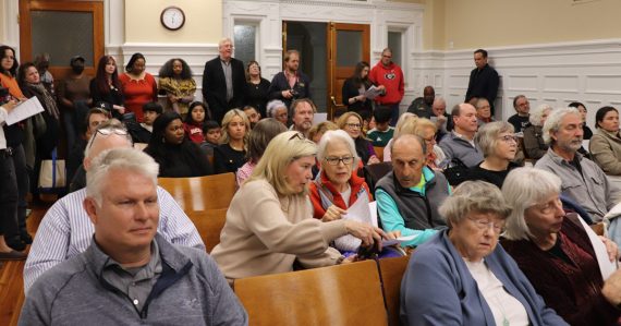 Audience in the commission chamber at city hall