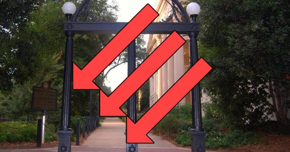 The UGA Arch with three downward facing arrows superimposed.