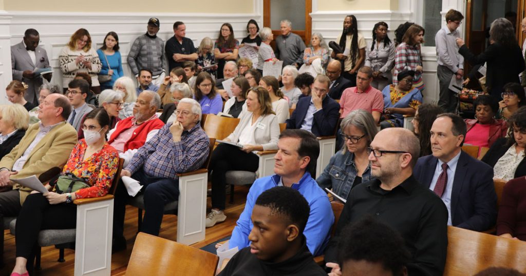Crowd at city hall meeting