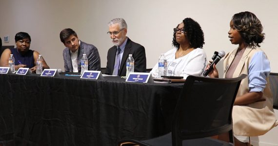Commissioner candidates debate at a town hall forum